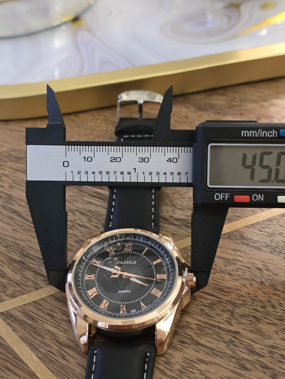 Yazole Men's Black Dial Rose Gold Case Leather Strap Watch
